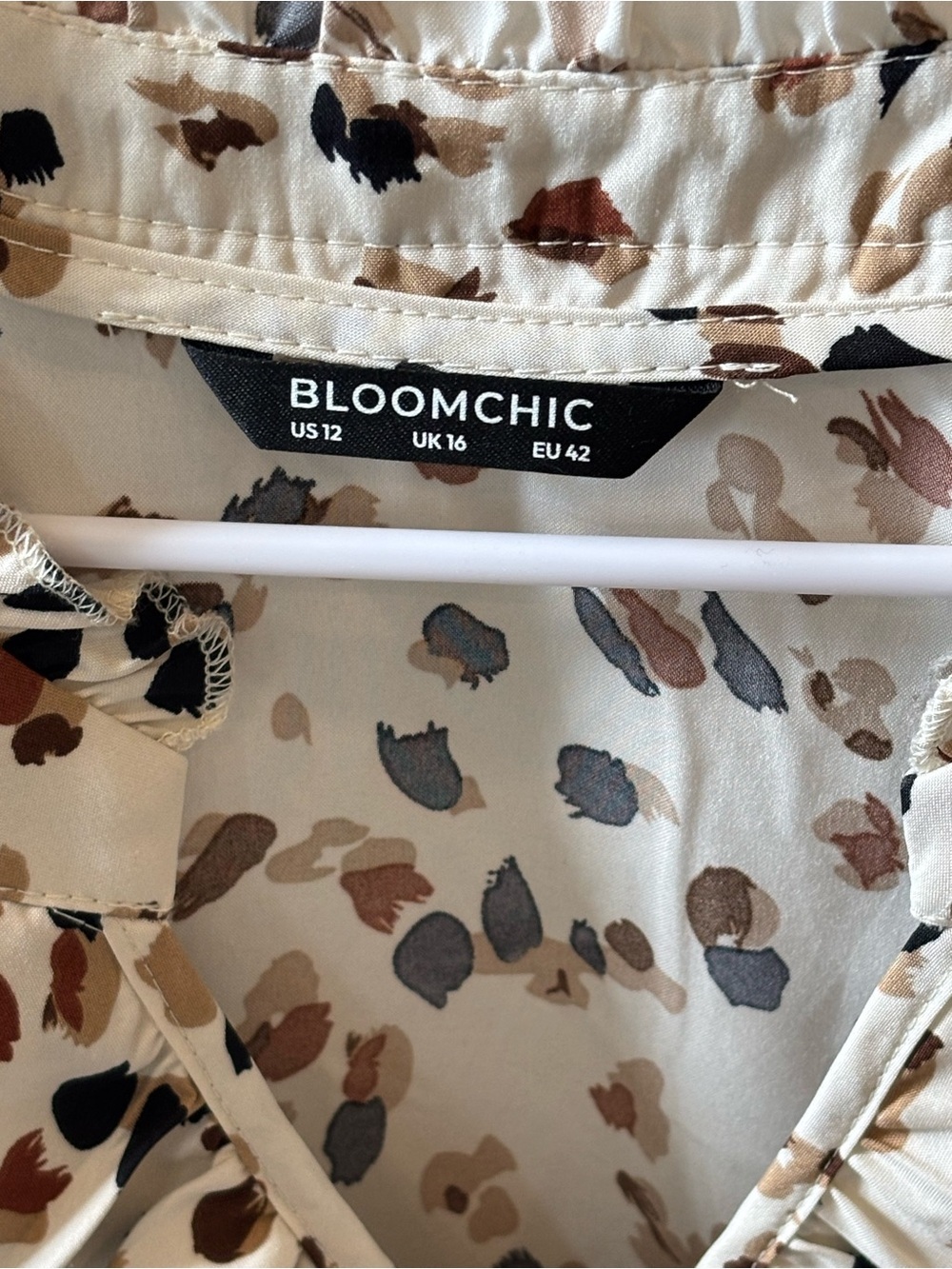 BloomChic Cream Leopard-Spot Ruffle V-Neck Blouse with Brown & Black Spots - Picture 2 of 3